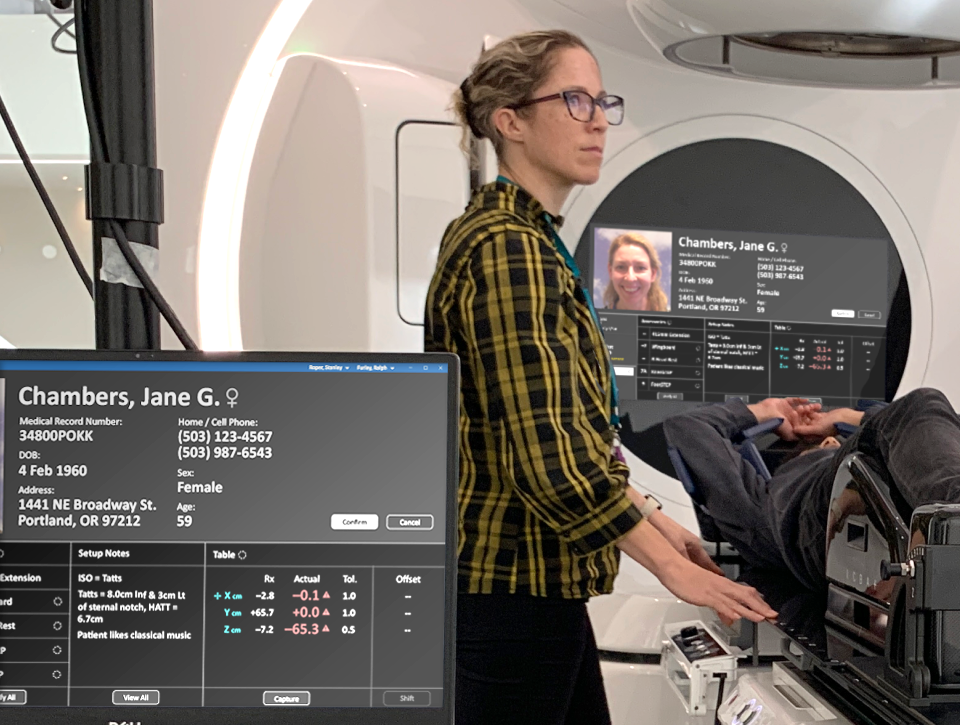 A radiotherapist participating in a radiotherapy equipment formative test using a representative prototype.